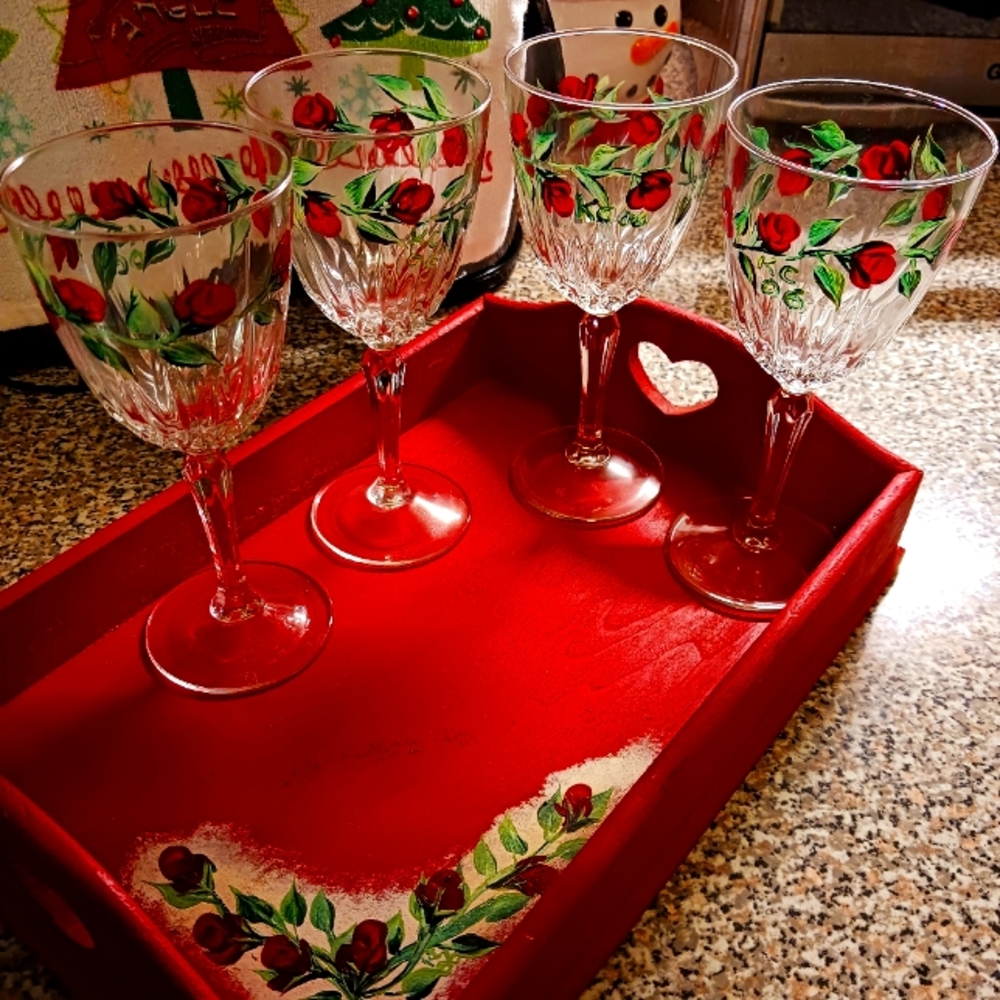 Four wine glasses with tray.